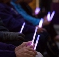 purple glow stick ceremony